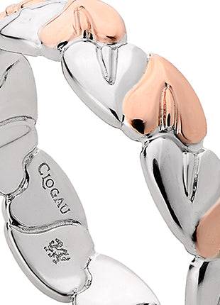 A Clogau Tree of Life® Ring 3STLR01 with hearts on it.