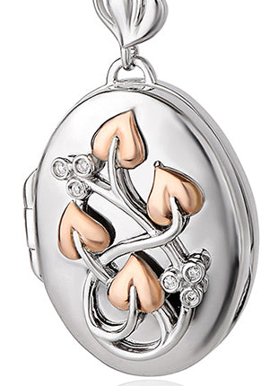 A CLOGAU Tree of Life® Diamond Locket 3STOLLP with hearts on it.