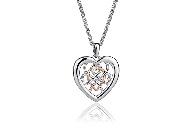 A Clogau Welsh Royalty Heart Pendant 3SWLRP with a silver and rose gold chain.