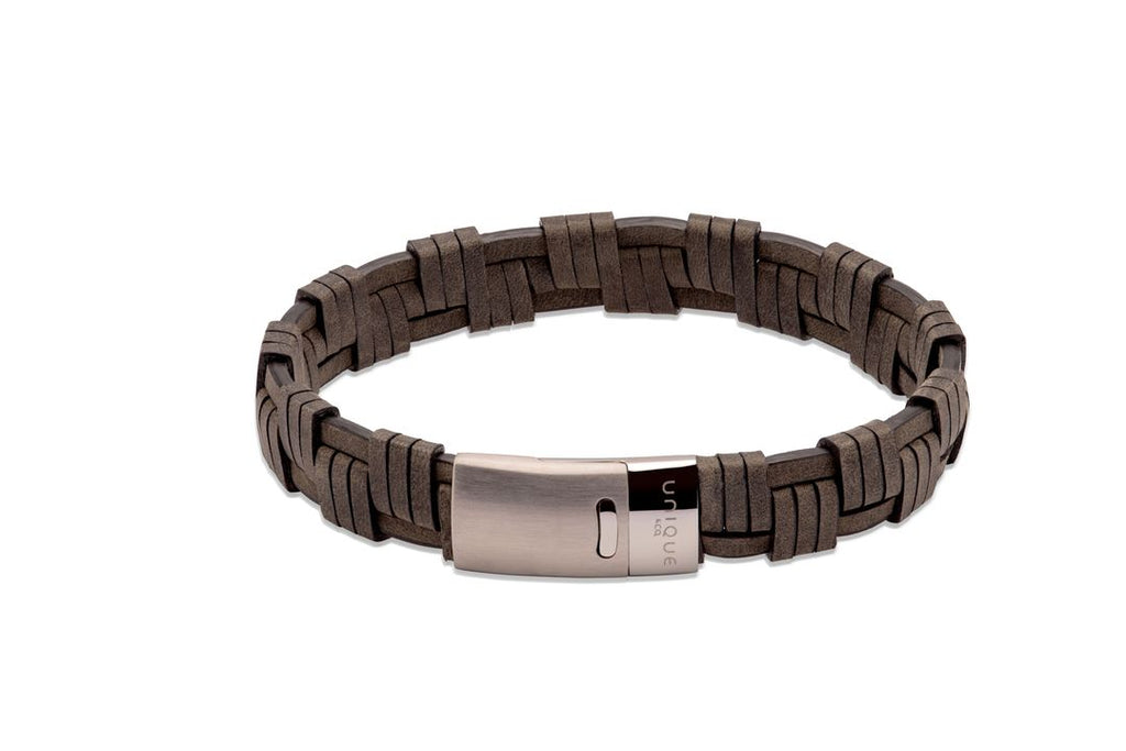 A MEN'S LEATHER WOVEN BRACELET ANTIQUE BLACK BY UNIQUE & CO with a stainless steel clasp.
