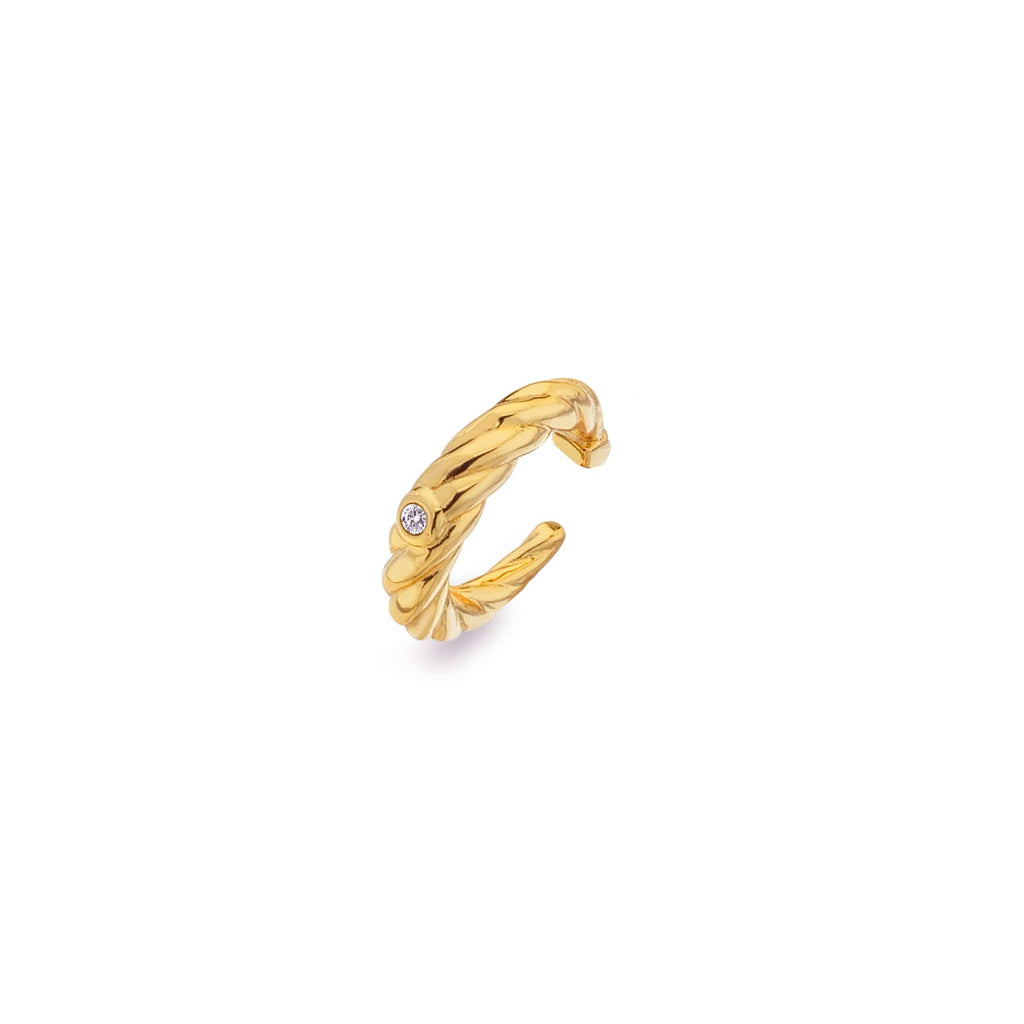 A gold ring with a Hot Diamonds X Jac Jossa Entwine Ear Cuff on it.