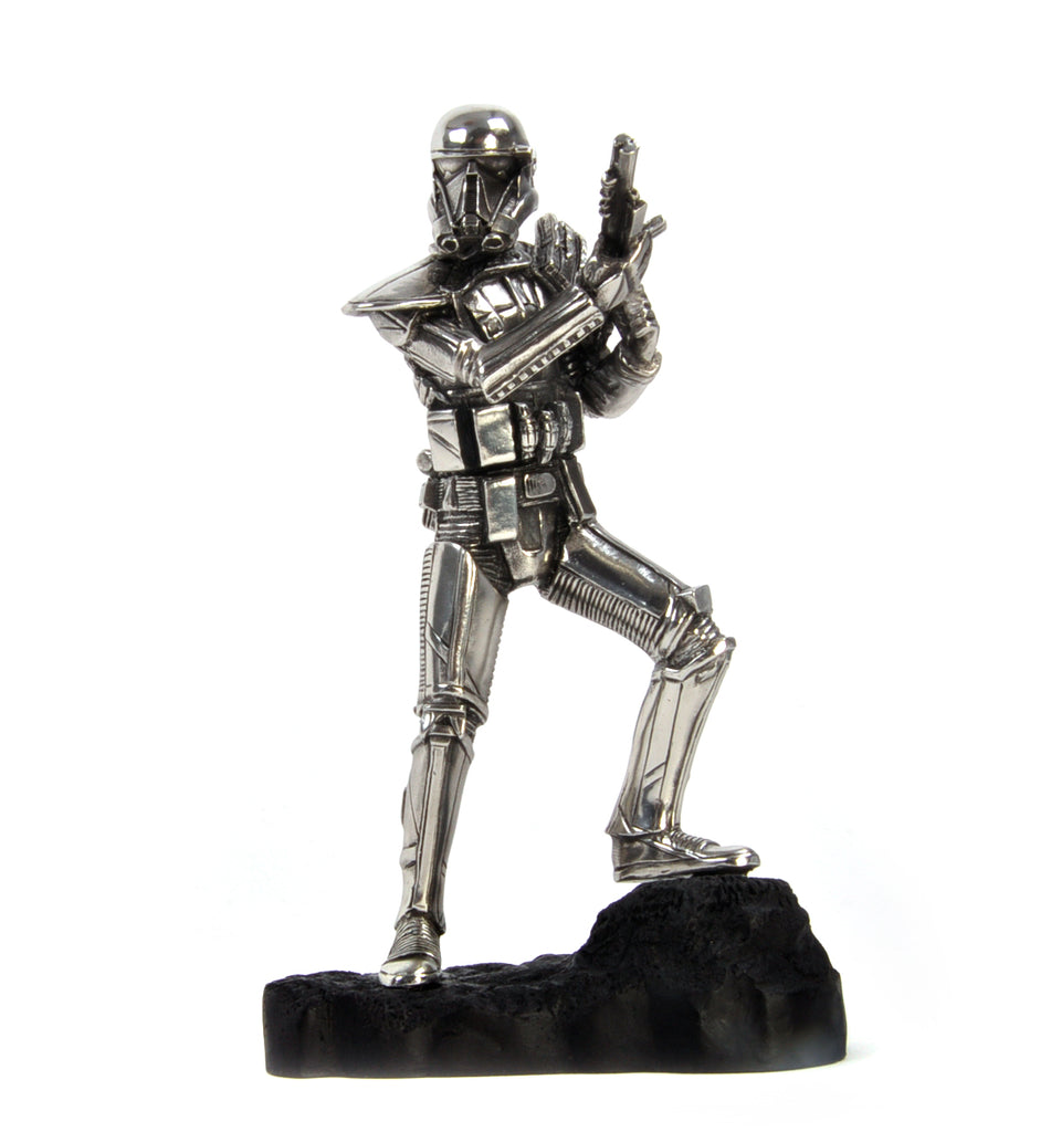 A Death Trooper Star Wars Figurine 017918R on top of a black background.