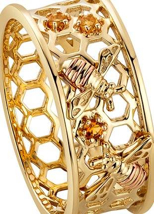 A Clogau Honey Bee Honeycomb Ring HNBWR with bees and orange stones.
