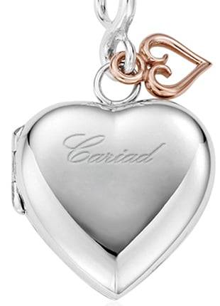 A Clogau Cariad® Locket with a heart shaped charm.