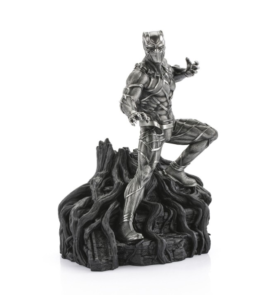 A Black Panther Figurine Limited Edition on top of a tree.