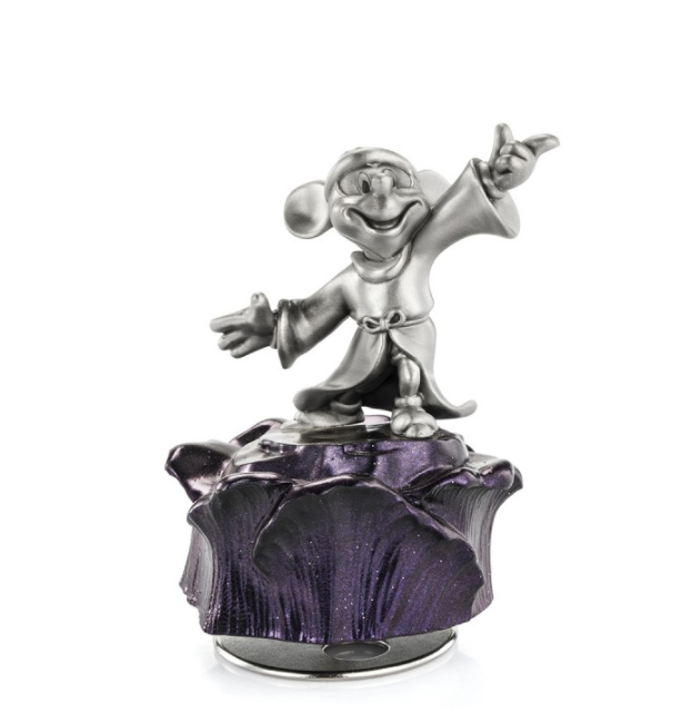 A Mickey Mouse Sorcerer Music Carousel 016316 figurine of a gnome on top of a purple flower.