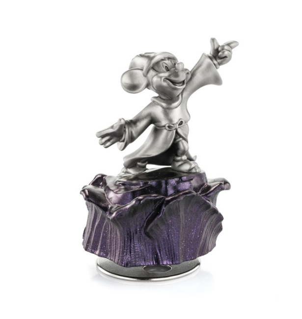 Mickey Mouse Sorcerer Music Carousel 016316 figurine on top of a purple rock.