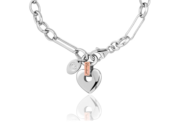 A Clogau Cariad Heart Bracelet with a heart charm.