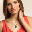 A woman wearing the Thomas Sabo Women-Charm-Pendant Moon dark blue Charm Club 925 Sterling silver Y0006-771-1 in a red shirt.