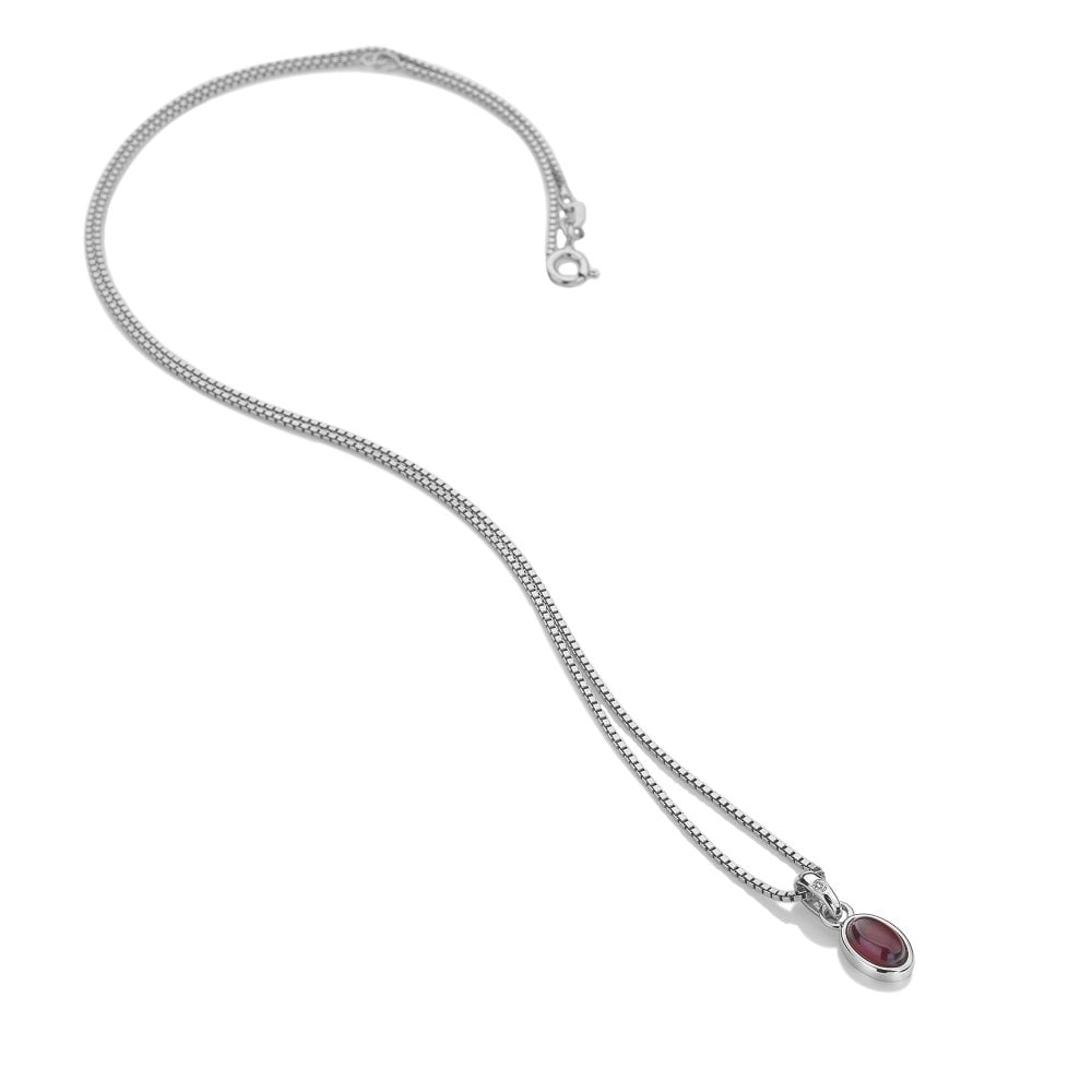 A silver necklace with a January Birthstone Necklace – Garnet pendant.
