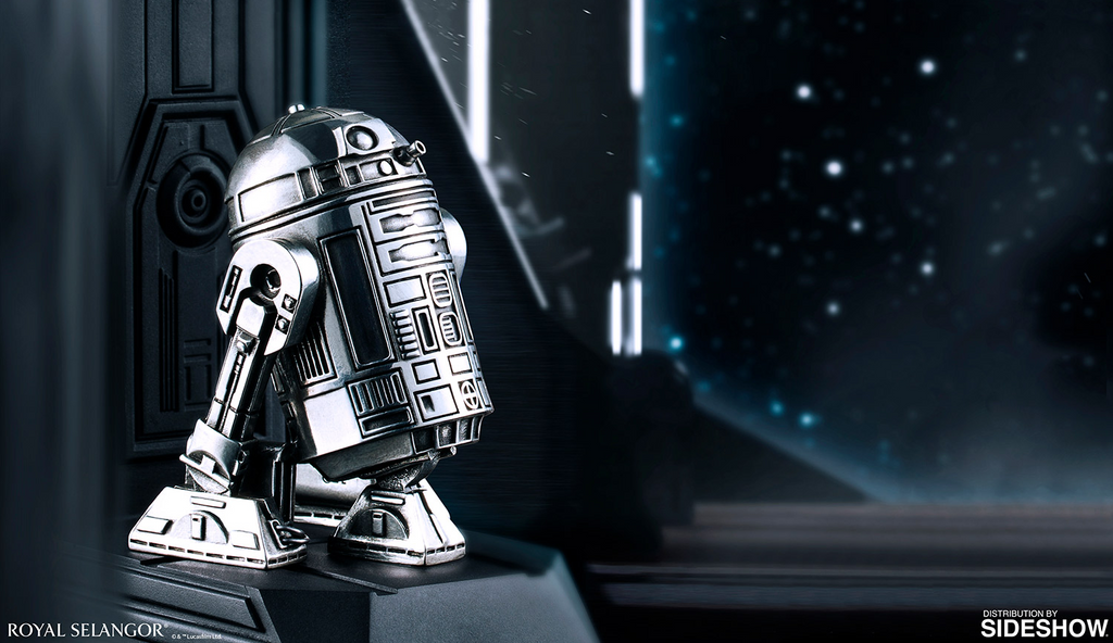 A R2-D2 Star Wars Bookend on a black surface.