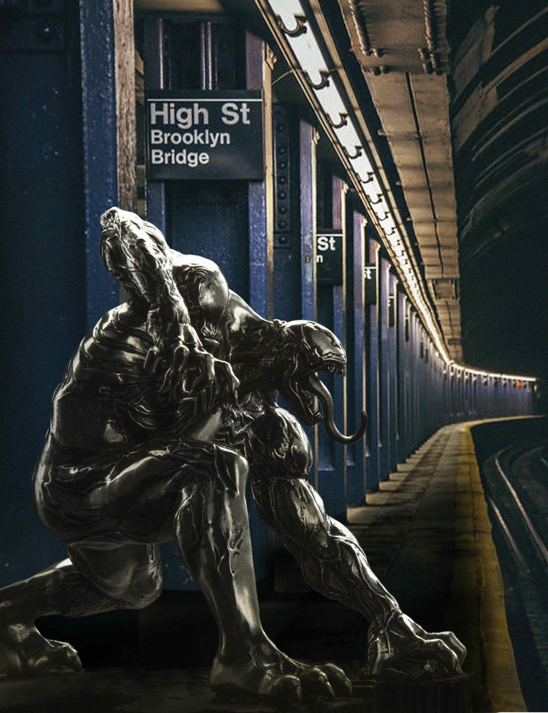 A statue of a Venom Black Malice Figurine. Limited Edition 017942 in a subway station.